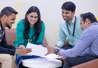 Group of Employees in an animated Discussion 